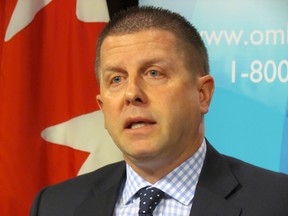 Ontario Ombudsman Andre Marin announces an investigation into Hydro One billing practices at a Queen's Park media conference on Tuesday. Marin compared the utility, owned by Ontario taxpayers, to a "slippery pig." (ANTONELLA ARTUSO/Toronto Sun)