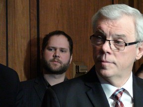 Premier Greg Selinger, joined by cabinet ministers Jennifer Howard and Andrew Swan, announced Tuesday that NDP MLA Christine Melnick has been removed from caucus Feb. 4, 2014. (RICH POPE/Winnipeg Sun)