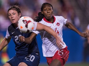 Canada’s Kadeisha Buchanan battles USA forward Abby Wambach for the ball during the first half of a Jan. 31 match at Toyota Stadium in Frisco, Texas. Canada lost 1-0. (USA TODAY)