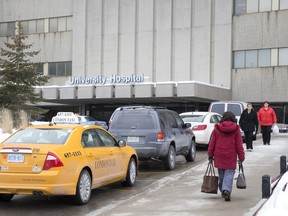 Cars and taxis line up outside the front entrance to University Hospital in London, Ontario on Tuesday, February 4, 2014. (CRAIG GLOVER, The London Free Press)