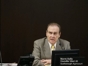Deputy Mayor Norm Kelly presides over a meeting of the executive committee at City Hall on Tuesday. (MICHAEL PEAKE/Toronto Sun)