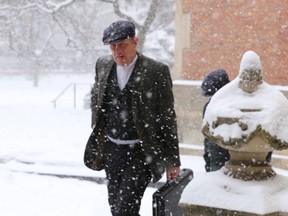 Dairy farmer Michael Schmidt arrives at the Ontario Court of Appeal for his hearing on Wednesday, Feb. 5, 2014. (MICHAEL PEAKE/Toronto Sun)