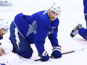 Steven Stamkos of the Tampa Bay Lightning stretches with the team during a morning skate ahead of action against the Toronto Maple Leafs in Toronto on Tuesday January 28, 2014. (Dave Abel/QMI Agency)