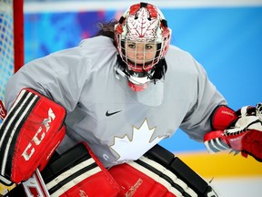 Canadian goaltender Shannon Szabados of Edmonton, Alta., tracks the puck during practice in Sochi Wednesday February 5, 2014. (AL CHAREST/QMI Agency)