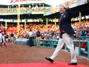 Former Boston Red Sox pitcher Curt Schilling is introduced before being inducted into the Red Sox Hall of Fame prior to the game against the Minnesota Twins during the game on August 3, 2012 at Fenway Park in Boston, Massachusetts. (Jared Wickerham/Getty Images/AFP)