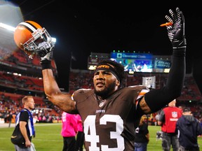 Cleveland Browns strong safety T.J. Ward (43) celebrates after defeating the Buffalo Bills 37-24 in a Thursday Night football game in 2013. (Andrew Weber-USA TODAY Sports)