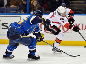 Ottawa Senators center Kyle Turris takes a shot while St. Louis Blues defenseman Roman Polak defends during the first period at Scottrade Center. (Jasen Vinlove-USA TODAY Sports)