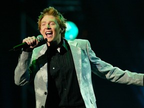 Singer Clay Aiken, an "American Idol" finalist performs onstage at the 31st annual American Music Awards in Los Angeles, California in this November 16, 2003 file photo. (REUTERS/Jim Ruymen/Files)