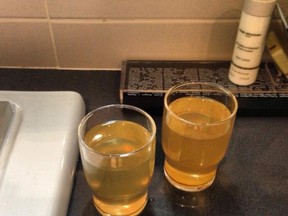 Water appears yellow in Chicago Tribune reporter Stacy St. Clair's room ahead of the Sochi Olympics. (twitter/@StacyStClair)