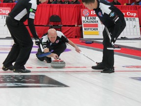 kevin Martin delivers a rock during the evening draw Thursday at the Boston Pizza Cup men's curling championship in Lacombe. (Brice Roy, QMI Agency)