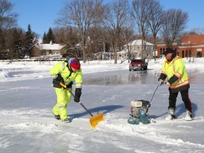 JOHN LAPPA/THE SUDBURY STAR/QMI AGENCY
James Humphrey, left, and Al Thibeault, of Candu Engineering Construction, prepare an ice surface for the annual Pond Hockey Festival on the Rock that is being held from Feb. 7-9. The event has moved from the bay at Science North to an area near the Sudbury Canoe Club.
