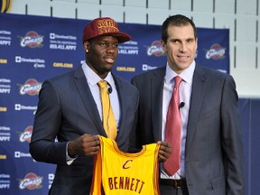 Anthony Bennett, the No. 1 pick of the 2013 NBA Draft by the Cleveland Cavaliers, is introduced alongside general manager Chris Grant at The Cleveland Clinic Courts on June 28, 2013 in Independence, Ohio. (David Liam Kyle/NBAE via Getty Images/AFP)