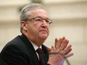 Canada's Chief Electoral Officer Marc Mayrand waits to appear before the Commons procedure and House affairs committee on Parliament Hill in Ottawa February 6, 2014. REUTERS/Chris Wattie