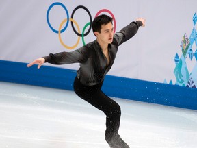 Patrick Chan performs during team men's short program at the 2014 Winter Olympic Games in Sochi, Russia, Feb. 6, 2014. (BEN PELOSSE/QMI Agency)