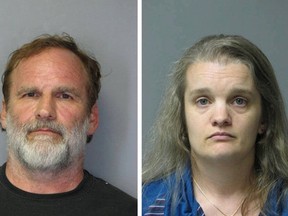 Dr. Melvin Morse, 58, and his wife Pauline, 40, are seen in this combination of booking photos released by the Delaware State Police August 9, 2012. (REUTERS/Delaware State Police/Handout)