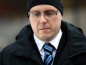 Phillip Ian Nolan walks out of the Ottawa Courthouse on Thursday February 6, 2014. Nolan, an Ottawa teacher, is charged with five counts each of sexual assault, sexual interference and sexual exploitation involving two under-age girls.  Darren Brown/Ottawa Sun/QMI Agency