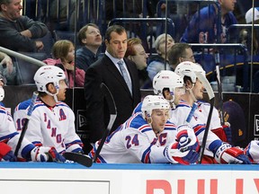 Alain Vigneault took over as head coach of the Rnagers this season after being fired by the Canucks. (USA TODAY)