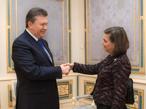 Ukraine's President Viktor Yanukovich (L) welcomes U.S. Assistant Secretary of State for European and Eurasian Affairs Victoria Nuland during a meeting in Kiev February 6, 2014.  (REUTERS/Mikhailo Markiv/Presidential Press Service/Handout via Reuters)