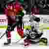 Ottawa Senators' Chris Neil (25) screens Buffalo Sabres goalie Jhonas Enroth (1) in the first period during NHL action in Ottawa, Ont. on Thursday February 6, 2014. Darren Brown/Ottawa Sun/QMI Agency