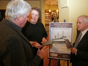 Peter Lockyer (right), organizer of History Nights at the Regent Theatre lecture series, speaks with Sean Billing (centre), the speaker at the Feb. 3, 2014  event and John Fulford-Brown, the producer of Bring Her on Home - The Return of the S.S. Keewatin, a documentary screened at the History Nights event. JASON MILLER/The Intelligencer/QMI Agency