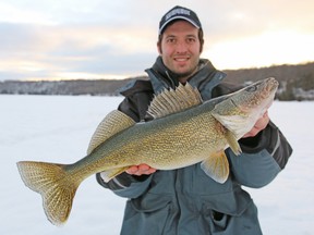 Eric Riley, of Ottawa, with a walleye caught and released on the Bay of Quinte last weekend. (Supplied photo)