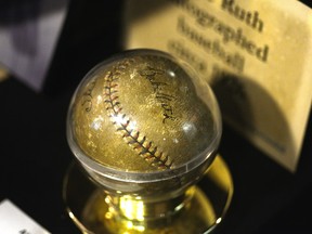 A baseball autographed by Babe Ruth, similar to this one, was sold at auction for more than $250,000. (MORRIS LAMONT/QMI Agency)