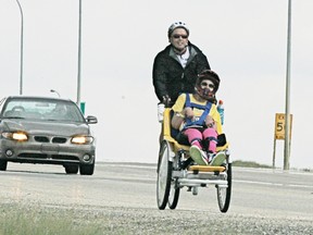 Morrie Ripley and Chandra Round at the Great White North triathlon in 2013. - File Photo