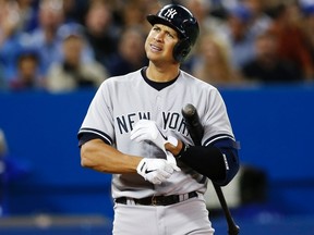 New York Yankees Alex Rodriguez reacts during an at bat against the Toronto Blue Jays during the fifth inning of their game in Toronto in this file photo taken September 17, 2013. (REUTERS/Mark Blinch/Files)