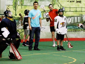 Jeremy Thompson (right) of the Edmonton Rush was on hand Sunday to mentor two lacrosse teams that will represent Alberta in the 2014 North American Aboriginal Games to be held in Regina in July. - Gord Montgomery, Reporter/Examiner