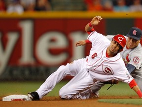 Base-stealer Billy Hamilton made a splash late last season for the Reds while Cards' young 2B Kolten Wong struggled with a .157 average. (Reuters)