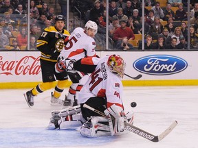 Feb 8, 2014; Boston, MA, USA; Ottawa Senators goalie Craig Anderson (41) makes a save during the third period against the Boston Bruins at TD Banknorth Garden. Mandatory Credit: Bob DeChiara-USA TODAY Sports