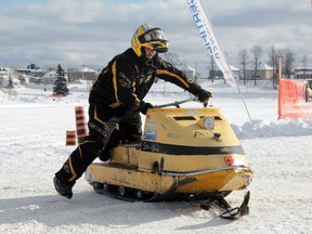 Stéphane Fortier may have finished in last place in Sunday’s vintage snowmobile race during the Cochrane Winter Carnival’s kickoff weekend, but he sure looked good doing it on his 1967 Ski-Doo Alpine. BENJAMIN AUBÉ/Sun Media Corporation