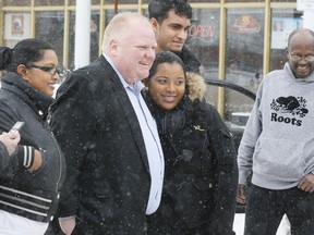 Mayor Rob Ford is pictured outside of a Scarborough restaurant on Sunday. (STAN BEHAL, Toronto Sun)
