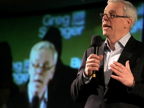 Manitoba Premier Greg Selinger speaks to delegates at the annual  NDP convention in Winnipeg, Man. Sunday February 09, 2014. (Brian Donogh/Winnipeg Sun/QMI Agency)