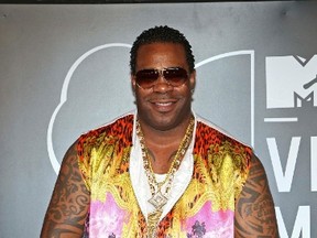 Rapper Busta Rhymes arrives for the 2013 MTV Video Music Awards in New York August 25, 2013.  (REUTERS/Andrew Kelly)