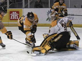 Kingston Frontenacs centre Sam Bennett tries to score against Sarnia Stings goaltender Taylor Dupuis during the second period at the Rogers K-Rock Centre on Sunday. (Julia McKay The Whig-Standard)
