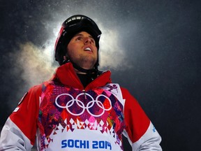 Canadian freestyle skier Alex Bilodeau looks back up the mountain during a night training session for the 2014 Sochi Winter Olympics in Rosa Khutor, Russia February 2, 2014.  (REUTERS)