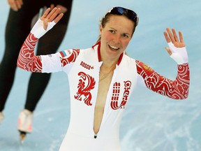Russian speed skater Olga Graf decided to, uh, cool off after her bronze-medal run. (PHIL NOBLE/Reuters)