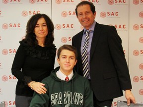 Sudbury's Michael Marcantognini is flanked by his parents, Fenya and Mauro, as he signed a letter of intent for Michigan State University last week, where he will study business and play soccer for the No. 7 nationally ranked Spartans. Supplied photo