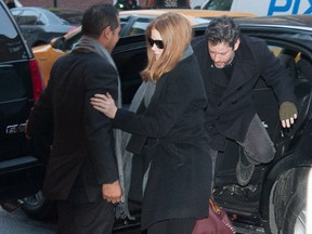 Amy Adams attends the wake for actor Philip Seymour Hoffman at the Frank E. Campbell Funeral Chapel on February 6, 2014 in New York City. Hoffman was found dead February 2 of an alleged drug overdose; he was found by a friend in his bathroom with a syringe in his arm.  (Dave Kotinsky/Getty Images/AFP)