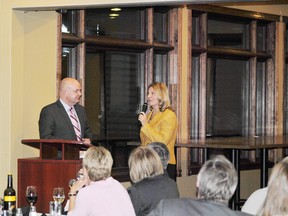 Whitecourt Mayor Maryann Chichak speaks to Alberta Minister of Health Fred Horne Friday Feb. 7 at the Whitecourt-Ste. Anne Progressive Conservative Association annual general meeting, held at the Whitecourt Golf and Country Club. Horne said a new hospital for Whitecourt is in the planning stages.
Barry Kerton | QMI Agency