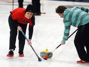 Sarah Regnier and Joel Tulloch sweep their rock during the third annual Curling Classic held at the Sydenham Community Curling Club on Feb. 8. Proceeds from the event will support the refurbishing of CKHA’s quiet room at the Sydenham Campus. Sixteen teams took part.