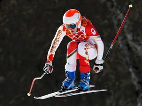 Canada's Marie-Michele Gagnon goes airborne during the downhill run of the women's alpine skiing super combined event at the 2014 Sochi Winter Olympics at the Rosa Khutor Alpine Center February 10, 2014. (REUTERS)