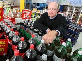 Quickie general manager Chris Wilcox reacted to a study by the Beer Store which claims suds could be $10 more a case if corner stores were allowed to sell booze, by saying it's not about price — it's about convenience. (DOUG HEMPSTEAD/Ottawa Sun)