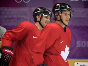 Jeff Carter got the first chance to build chemistry with Sidney Crosby (front) and Chris Kunitz (back) in Sochi for Team Canada. (AL CHAREST/QMI Agency)