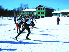 Racers leap from the gate at the start of the Senior Girls 5-km event during the North Western Ontario Secondary School Atheletic Association’s Nordic Ski Championships at Mount Evergreen on Monday, Feb. 10.