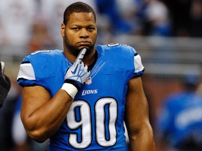Detroit Lions defensive tackle Ndamukong Suh stands on the field during warms-ups of their NFL football game against the Chicago Bears in Detroit, Michigan in this December 30, 2012 file photo. (REUTERS/Rebecca Cook/Files)
