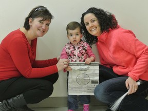 Backyardigans colouring contest winner Lauren Kalczak, 1 1/2 years old, poses for a photo with Charlotte Smith of the Vermilion Standard and her mom Jenna Kalczak. They won a prize pack including two tickets to the show at the Vic Juba Community Theatre in Lloydminster this past Thursday.