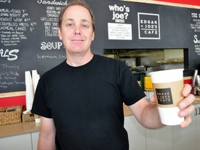 Neil Burnett, manager of food and hospitality, serves up a cup of coffee at Edgar and Joe’s Café Feb. 11, 2014 in London, Ont. The café, a social enterprise of Goodwill, celebrated a public grand opening after first opening its doors last summer. CHRIS MONTANINI\LONDONER\QMI AGENCY