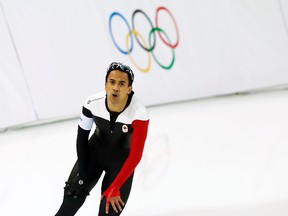 Canada's Gilmore Junio skates during the men's 500-metre long-track speed skating event at the Adler Arena during the 2014 Sochi Winter Olympics, Feb. 10, 2014. (PHIL NOBLE/Reuters)